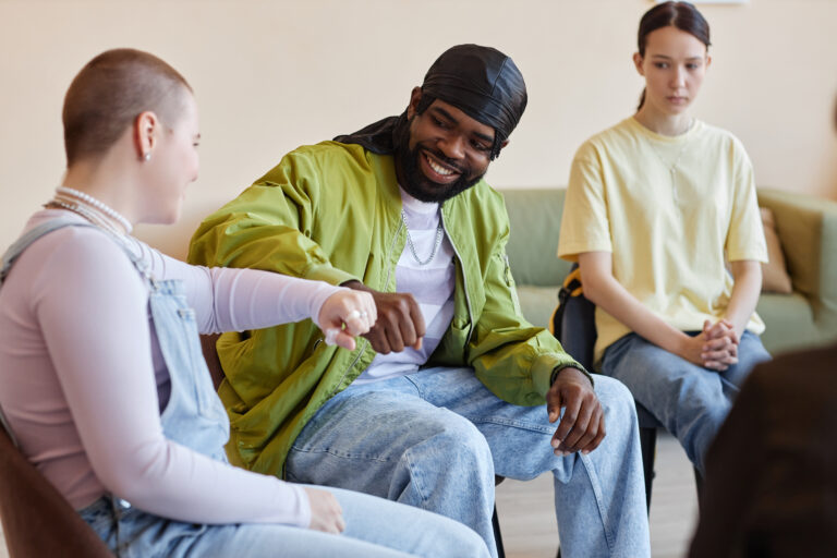 People sitting at psychotherapy session